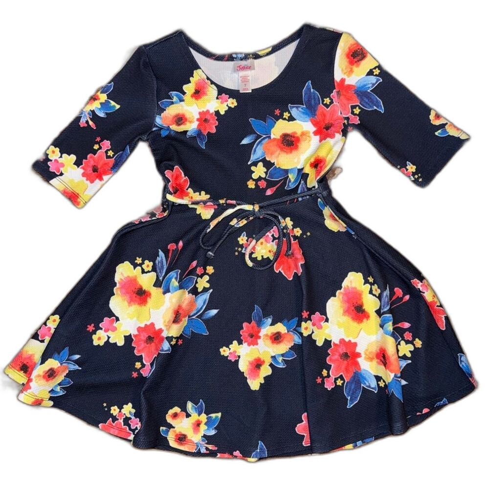 Justice navy blue floral dress with red, yellow, and blue flowers, girls size 7.